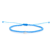 Blue adjustable beaded cross bracelet with silver charm