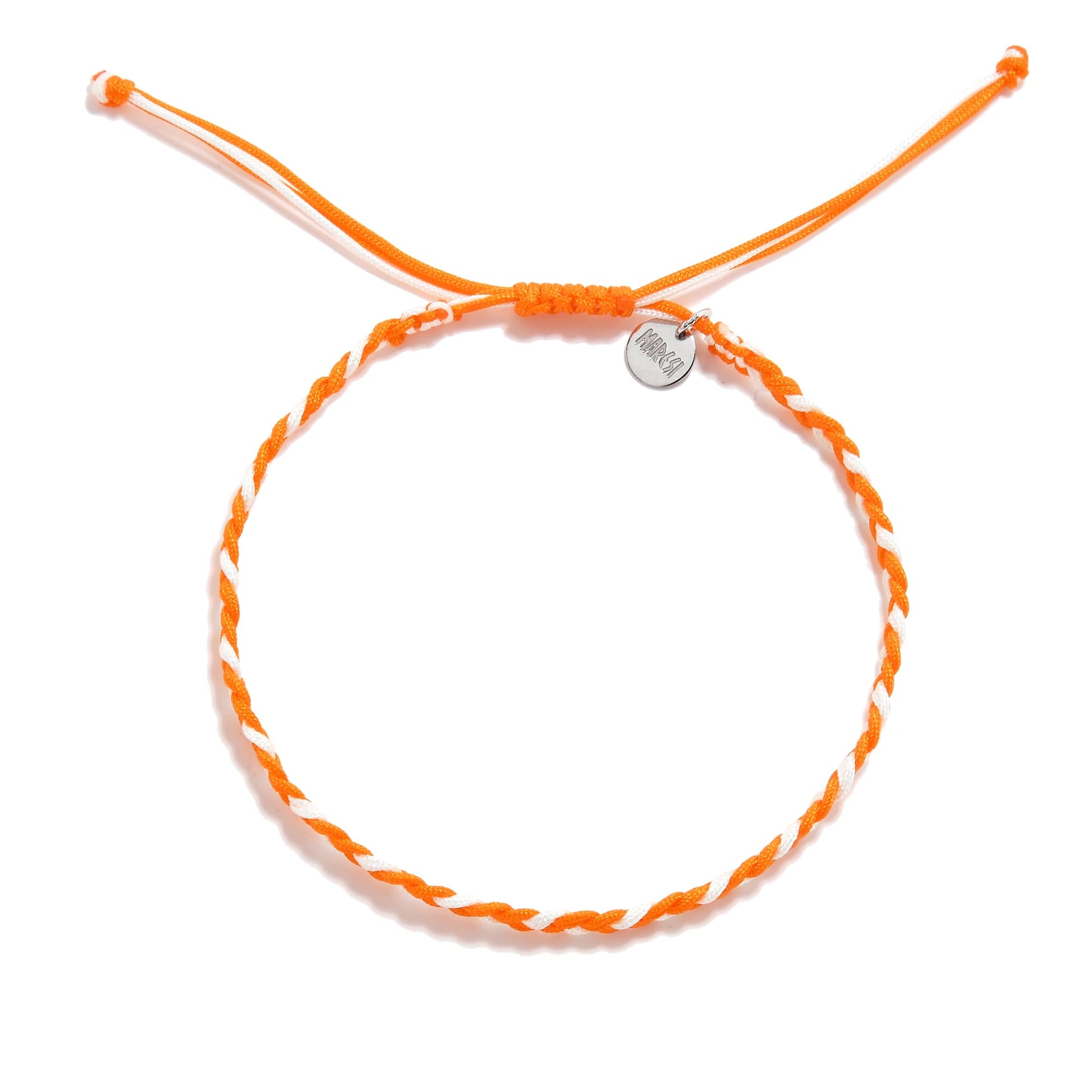 Flat lay of orange and white thread friendship bracelet with adjustable closure