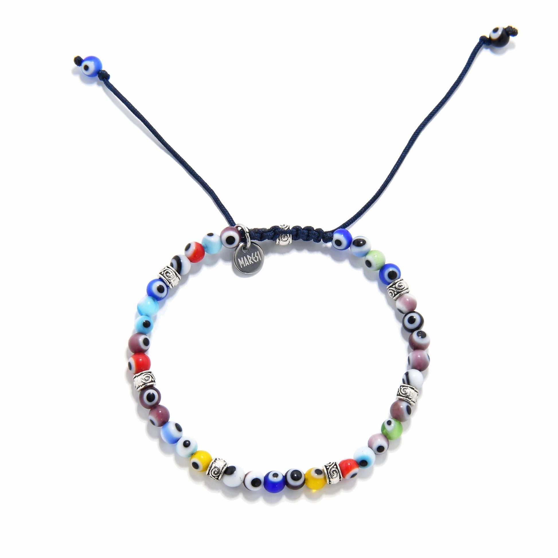 Flat lay of evil eye bracelet showcasing symmetrical bead arrangement and handmade detail