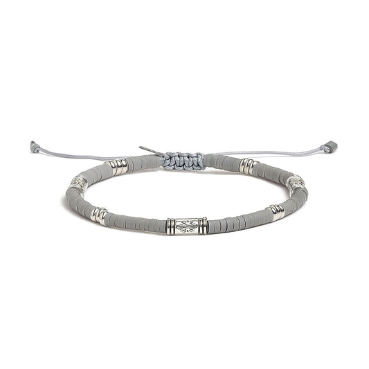 Gray Shamballa bracelet with metal decorative beads and adjustable closure.