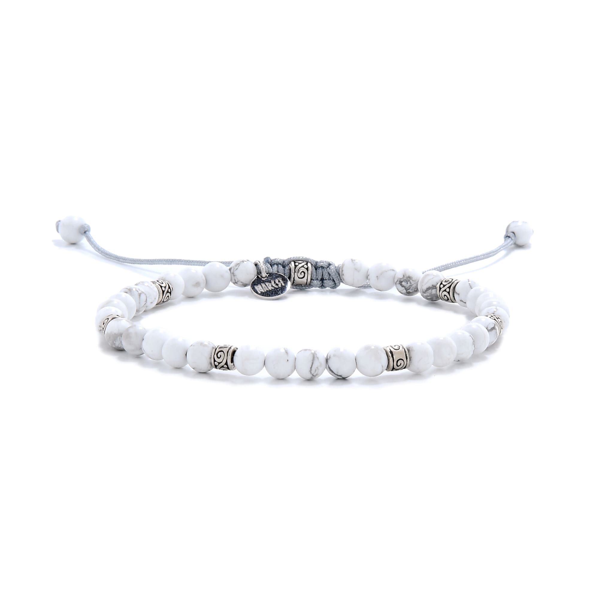 White crystal beaded bracelet with silver accents and adjustable cord