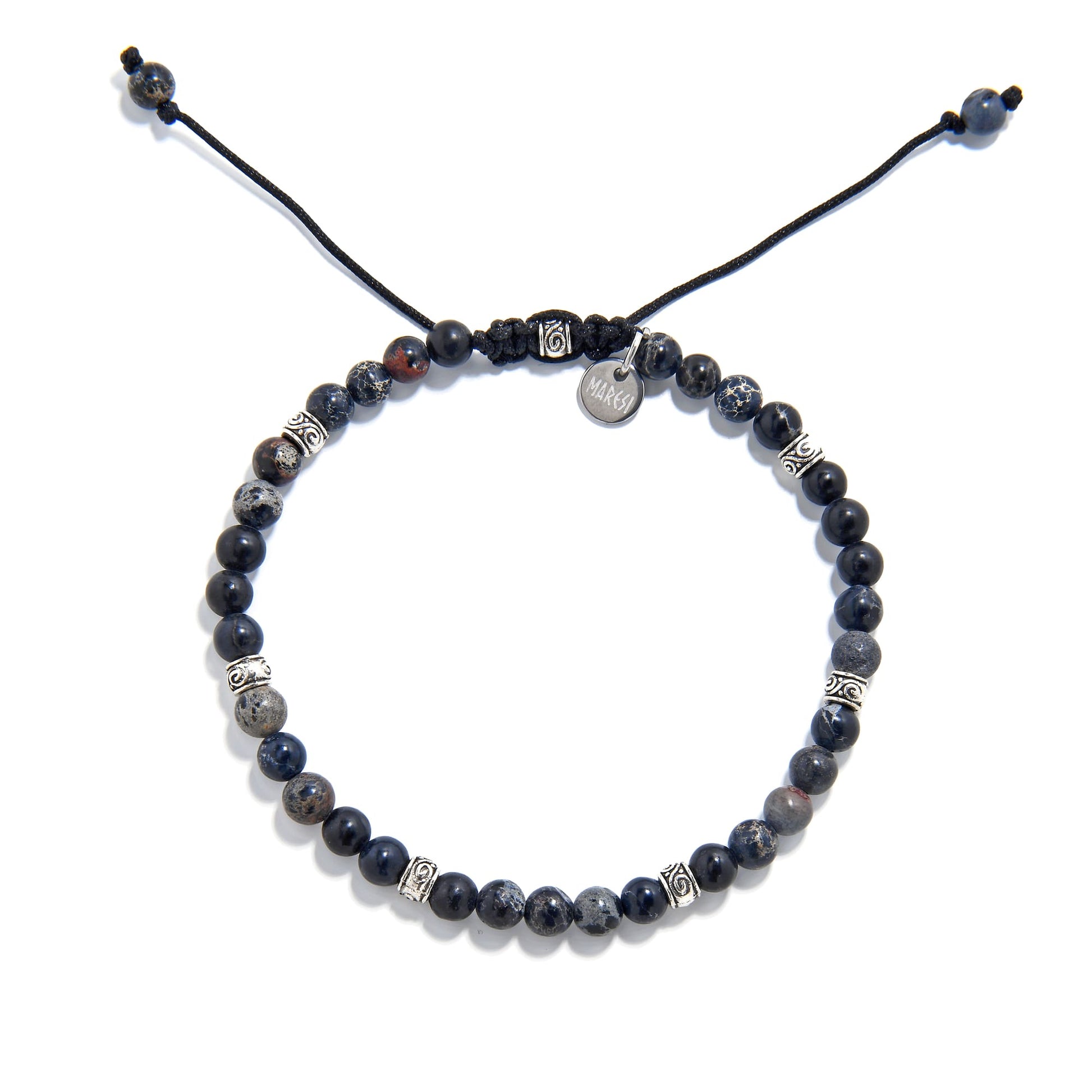 Black jasper beads bracelet with adjustable cord and metal charm, top view.