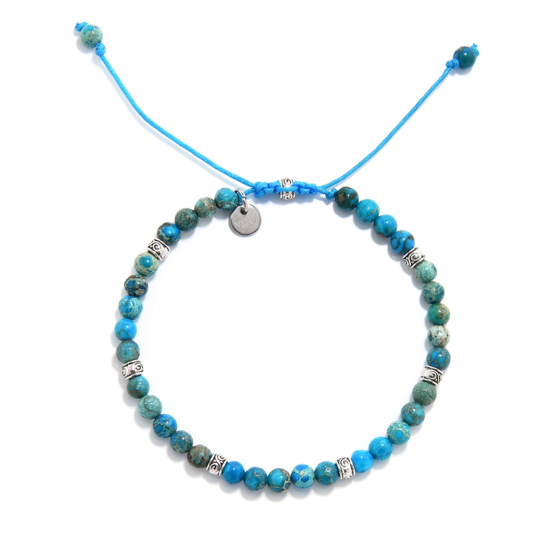 Blue jasper jewelry bracelet arranged in a circle with adjustable cord and charm