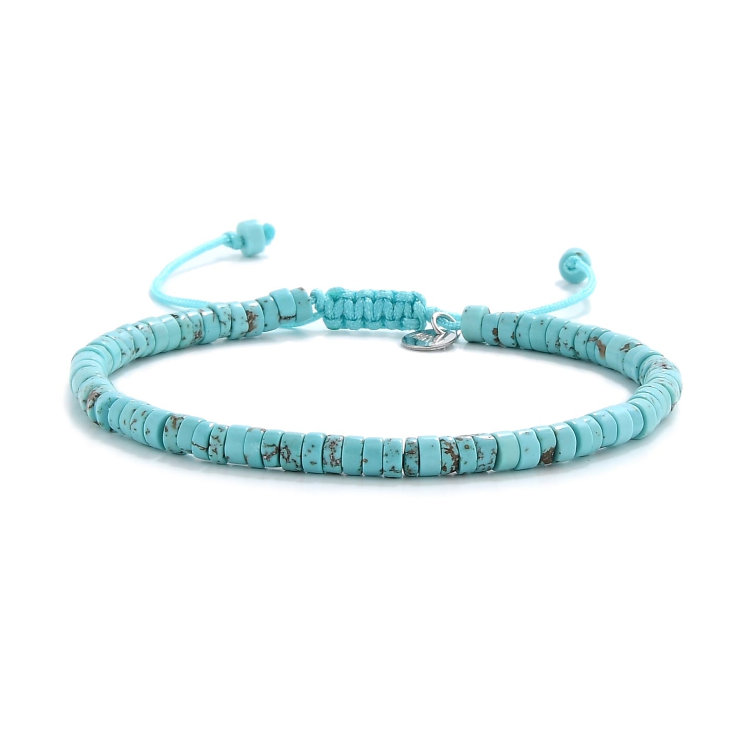 Front-facing image of turquoise beads bracelet with signature knot