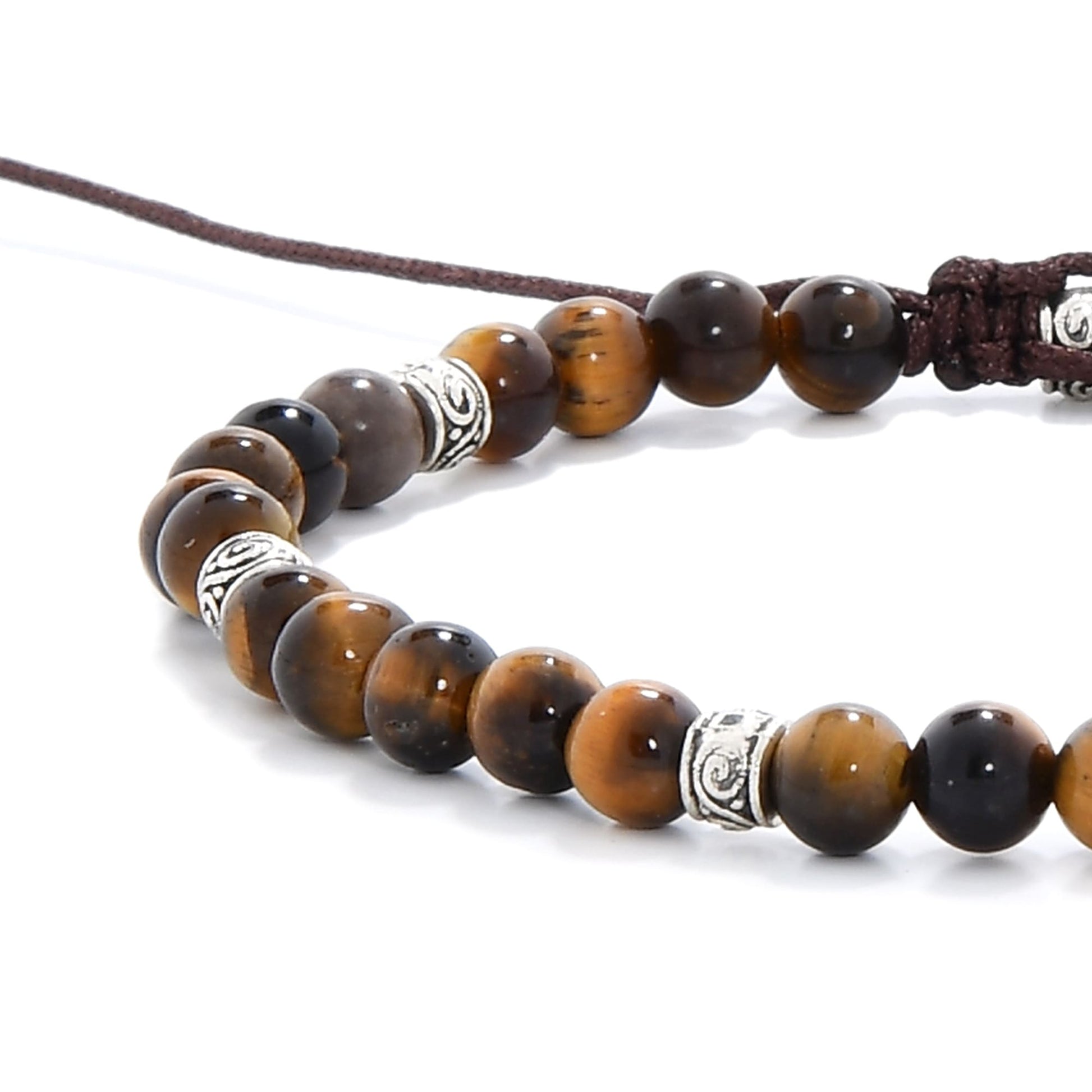 Detailed view of polished men’s tiger eye bracelet with natural brown gemstone beads