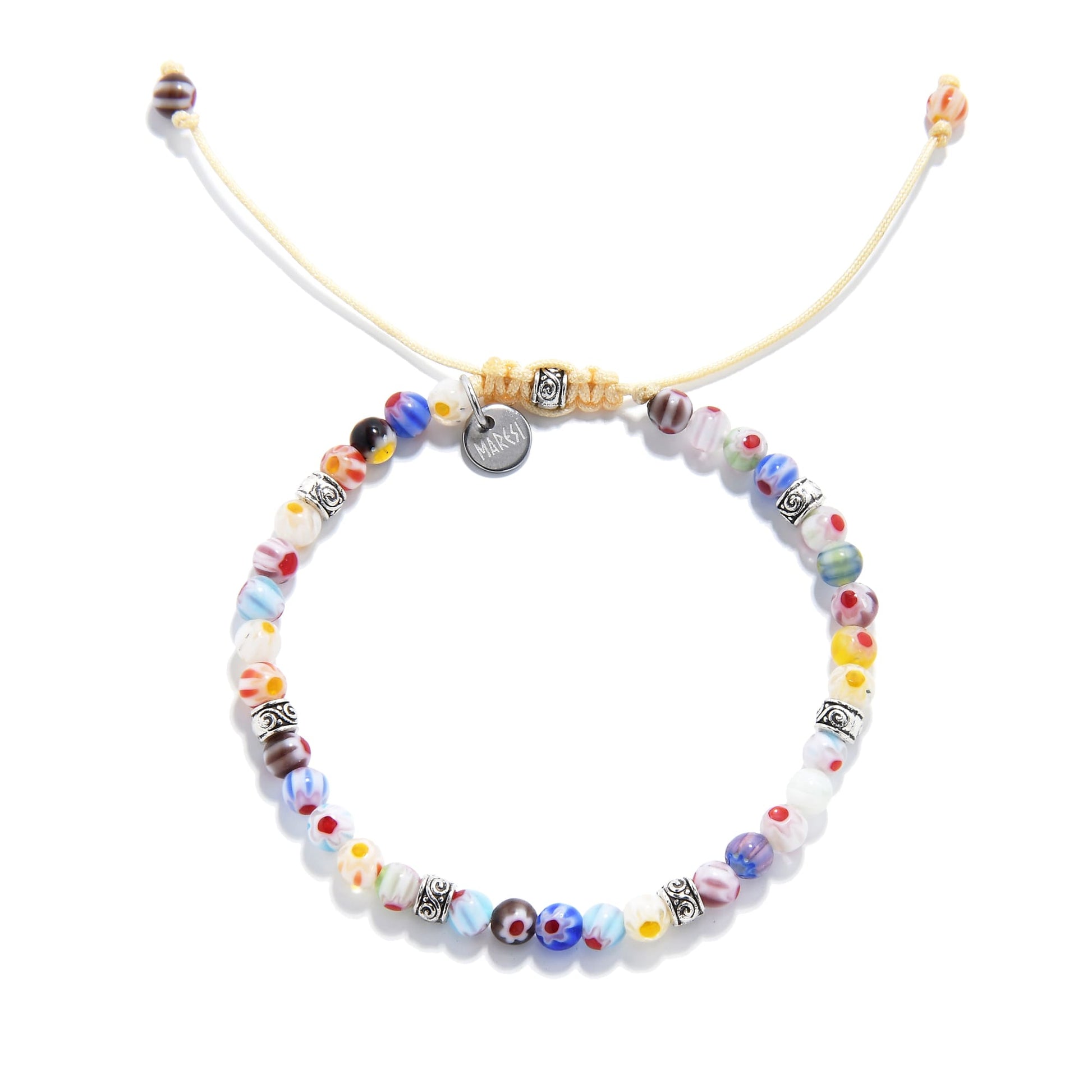 millefiori beads bracelet with round handcrafted beads and adjustable yellow cord, laid flat.