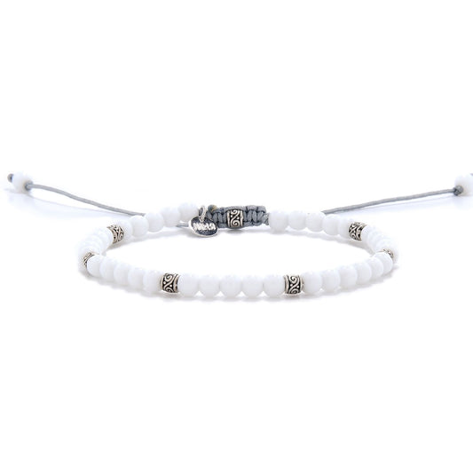 Elegant white jade stone bracelet with silver accents and adjustable cord.