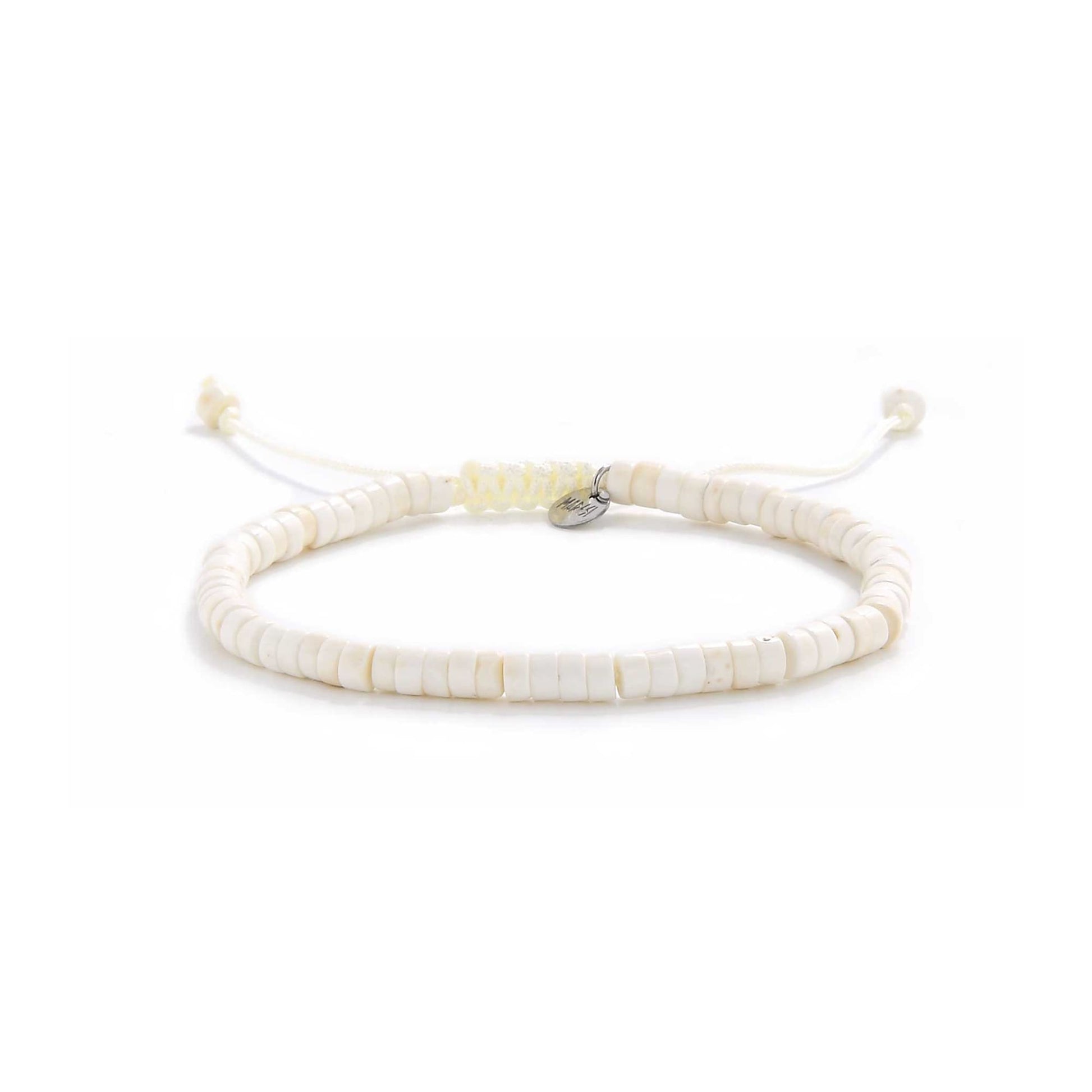 Full view of off white bracelet with clasp and cord