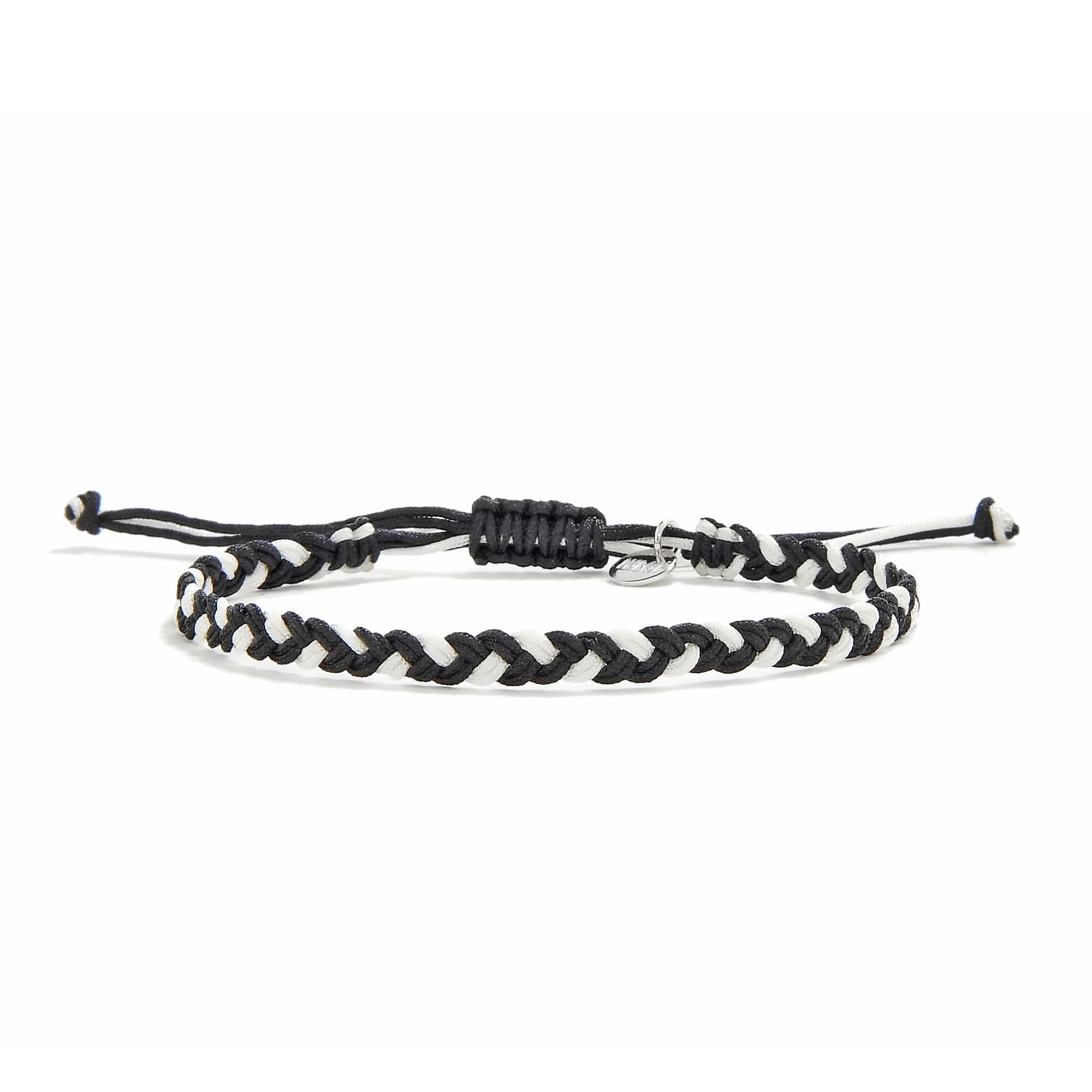 Black and white friendship woven bracelet with braided design and adjustable closure