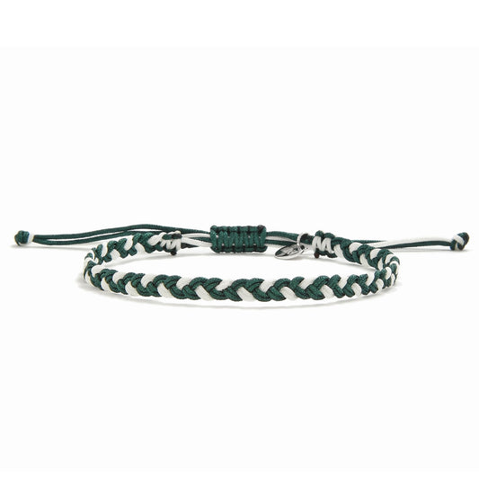 Handmade adjustable friendship bracelet in green and white with macrame-style knot and charm