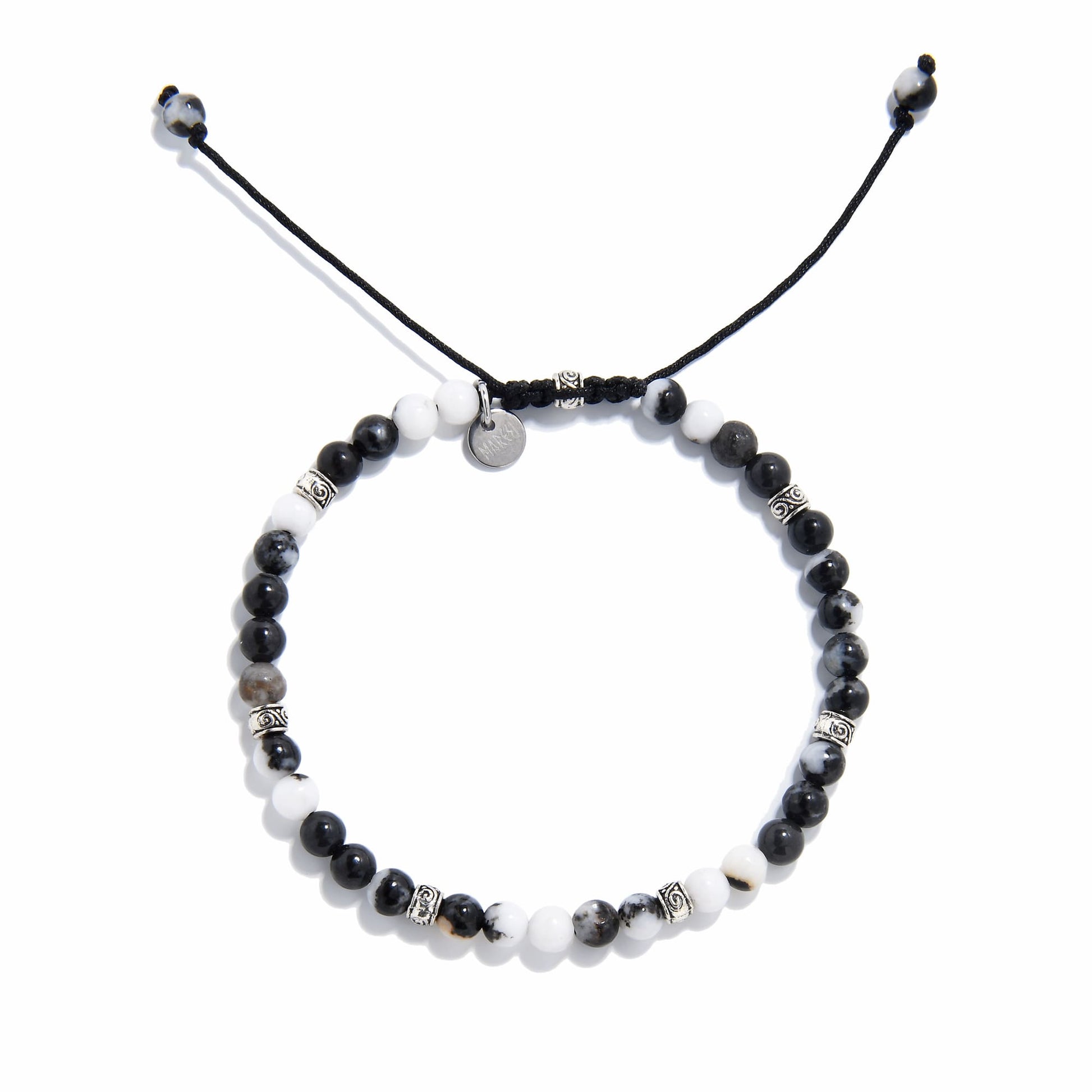 Top view of handmade zebra jasper bracelet with natural gemstone beads and silver accents.