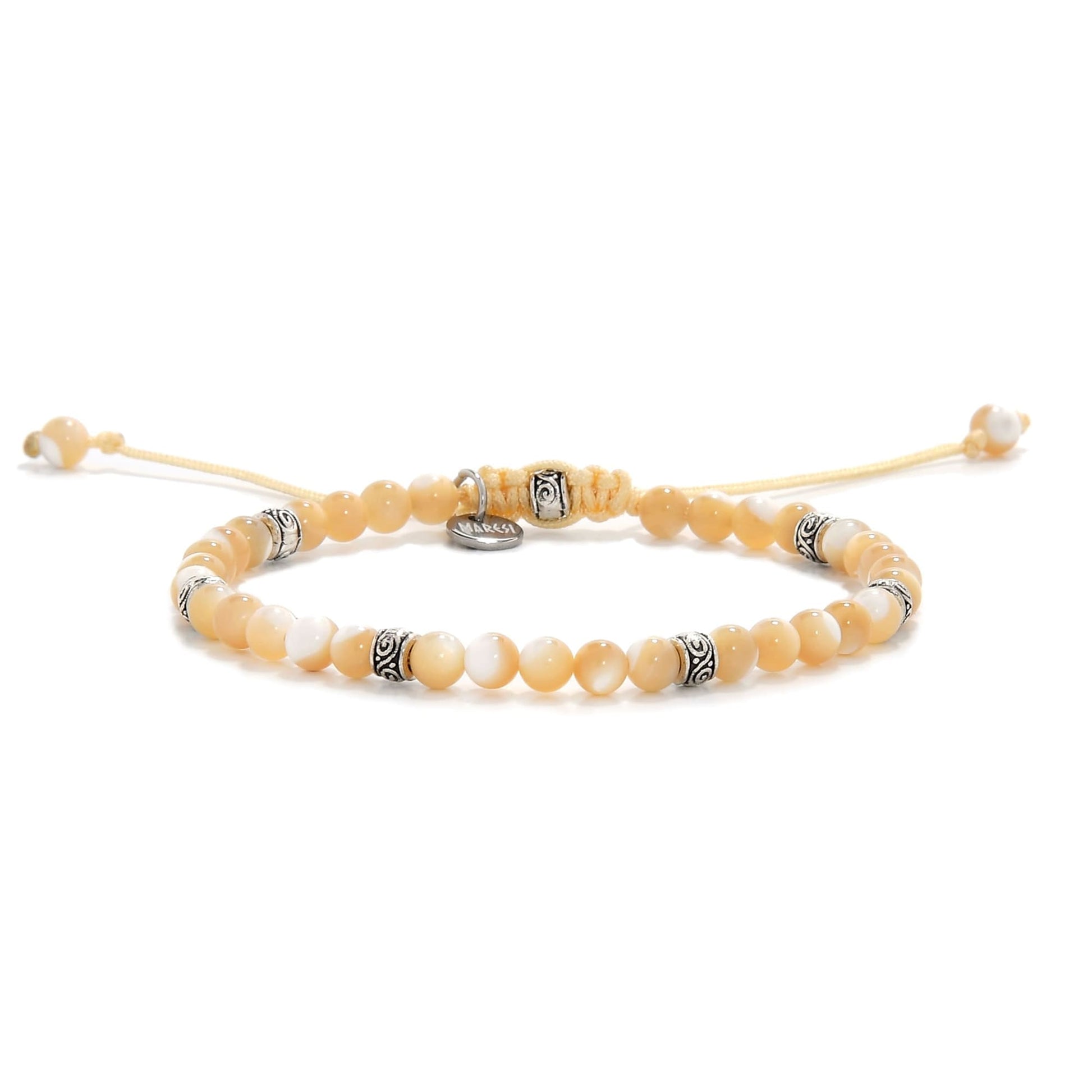 Elegant Mother of Pearl bracelet with silver beads on yellow cord.