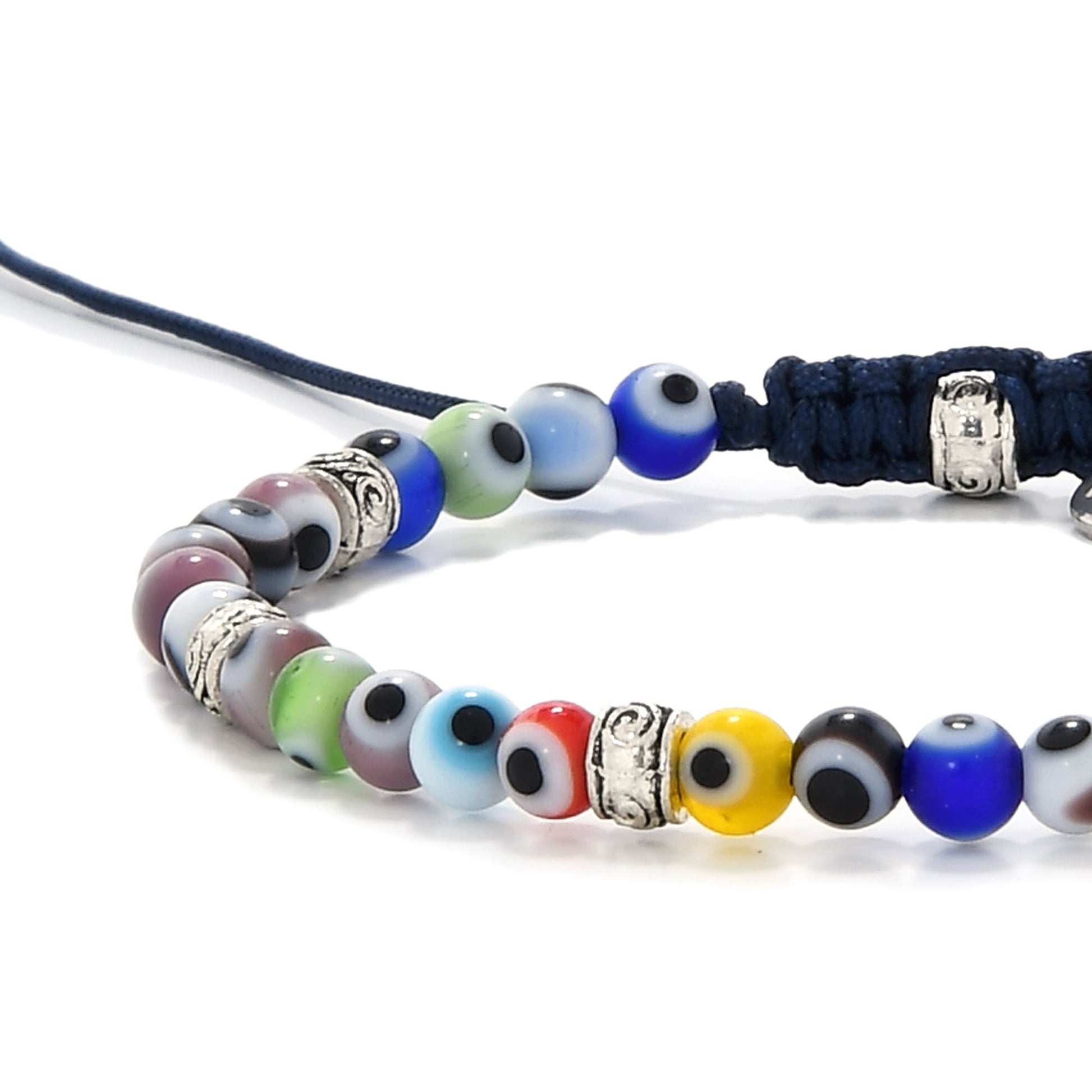 Close-up of colorful evil eye bracelet featuring round beads and detailed metal spacers