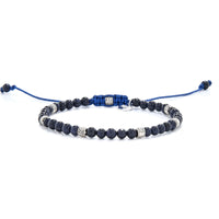 Sandstone Bracelet full angled view with dark blue beads, silver spacers, and blue cord closure
