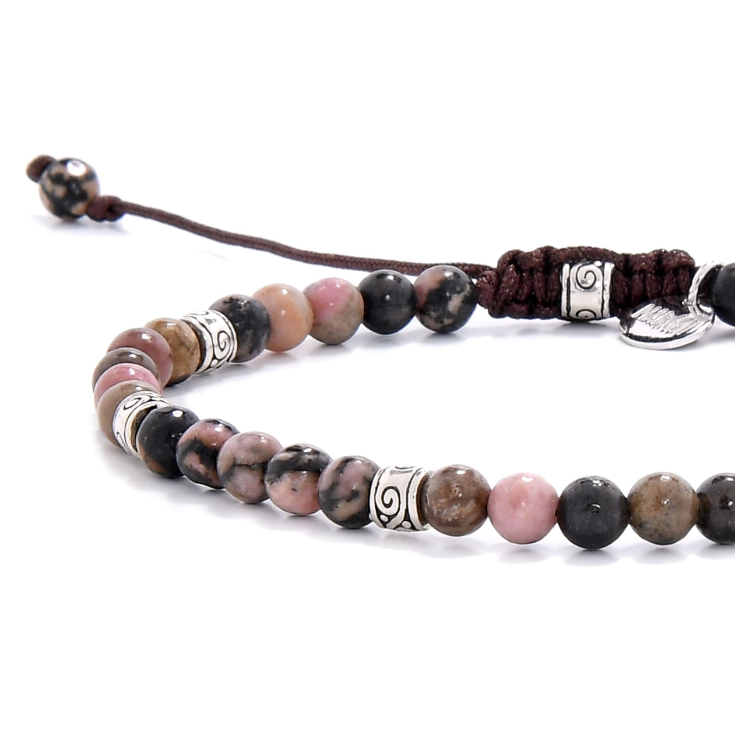 Close-up of rhodonite bracelet beads highlighting natural stone patterns and decorative metal-tone elements.