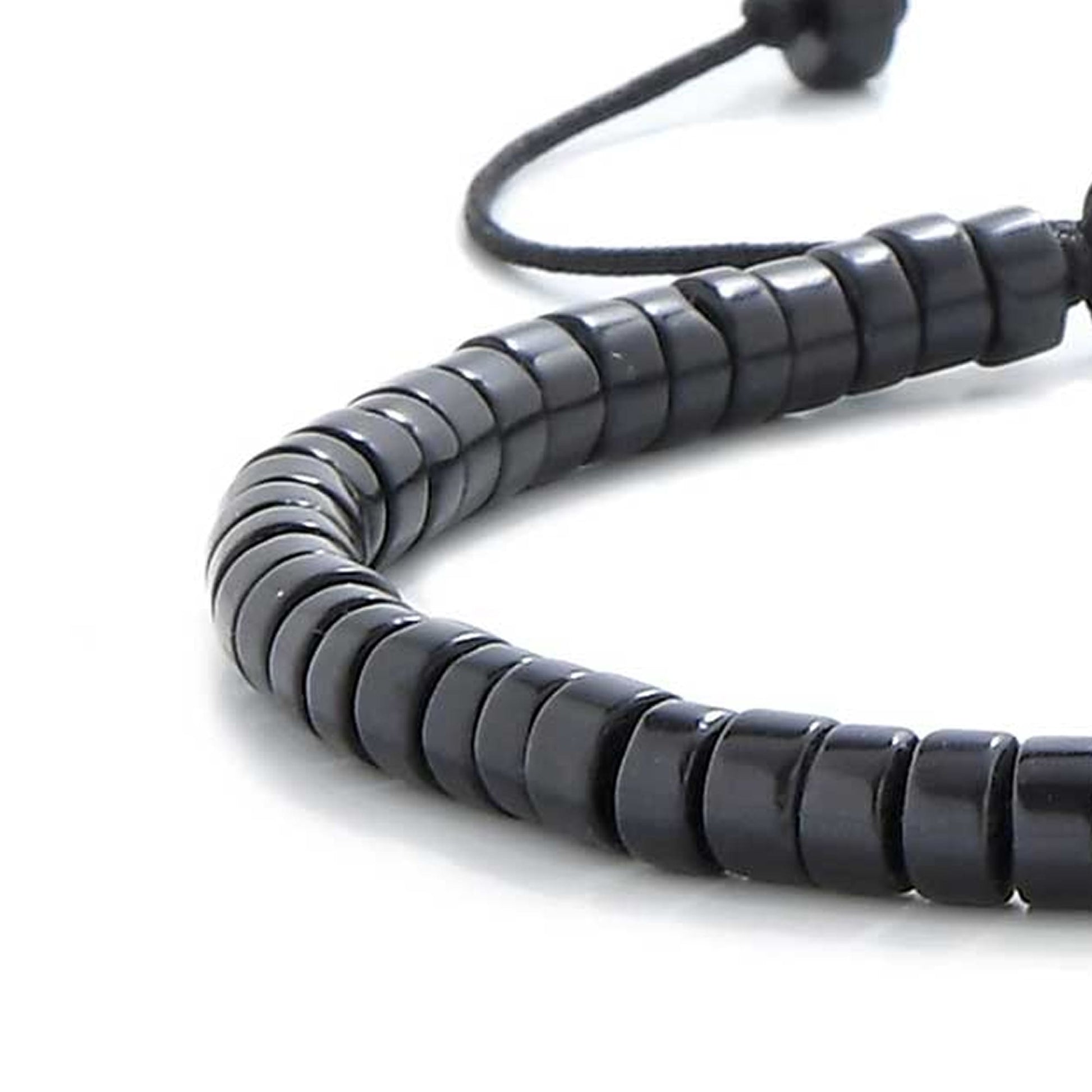 Close-up of MAVROS Clay men black bracelet showing smooth black beads