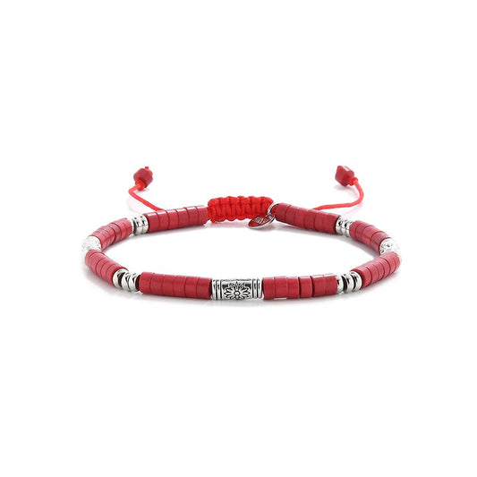 Front view of mens red bracelet with braided closure and engraved silver beads