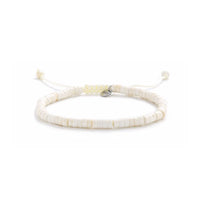 Off White Bracelet shown in full view with off white clay beads with blue accent bead and adjustable cord