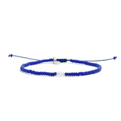 Seed Bead Bracelet Ideas shown in full view with blue seed beads with white accent beads and adjustable cord
