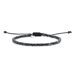 Seed Bead Bracelets shown in full view with black and gray Picasso seed beads and adjustable cord