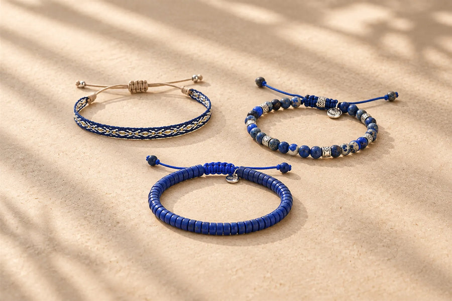 Three blue bracelets in woven, beaded, and clay styles illustrating different designs associated with blue bracelet meaning.