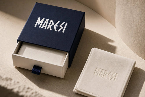 Bracelet gift for men presented in an elegant navy Maresi box with a soft cream jewelry pouch.