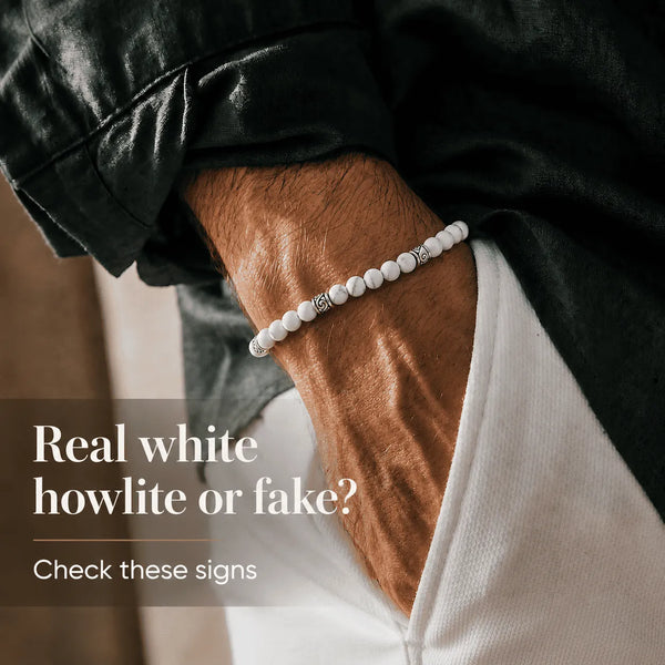 Real or fake white howlite bracelet guide with white howlite beads on a man's wrist