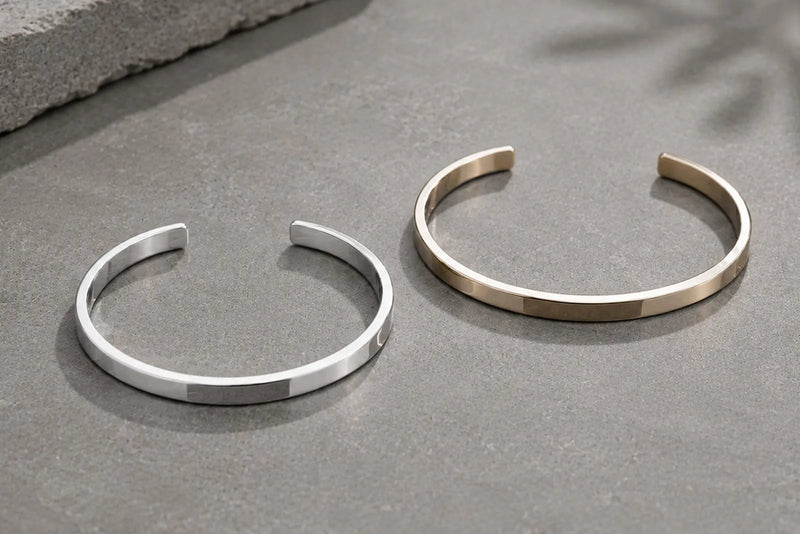 White gold vs silver cuff bracelets showing the difference in color and finish