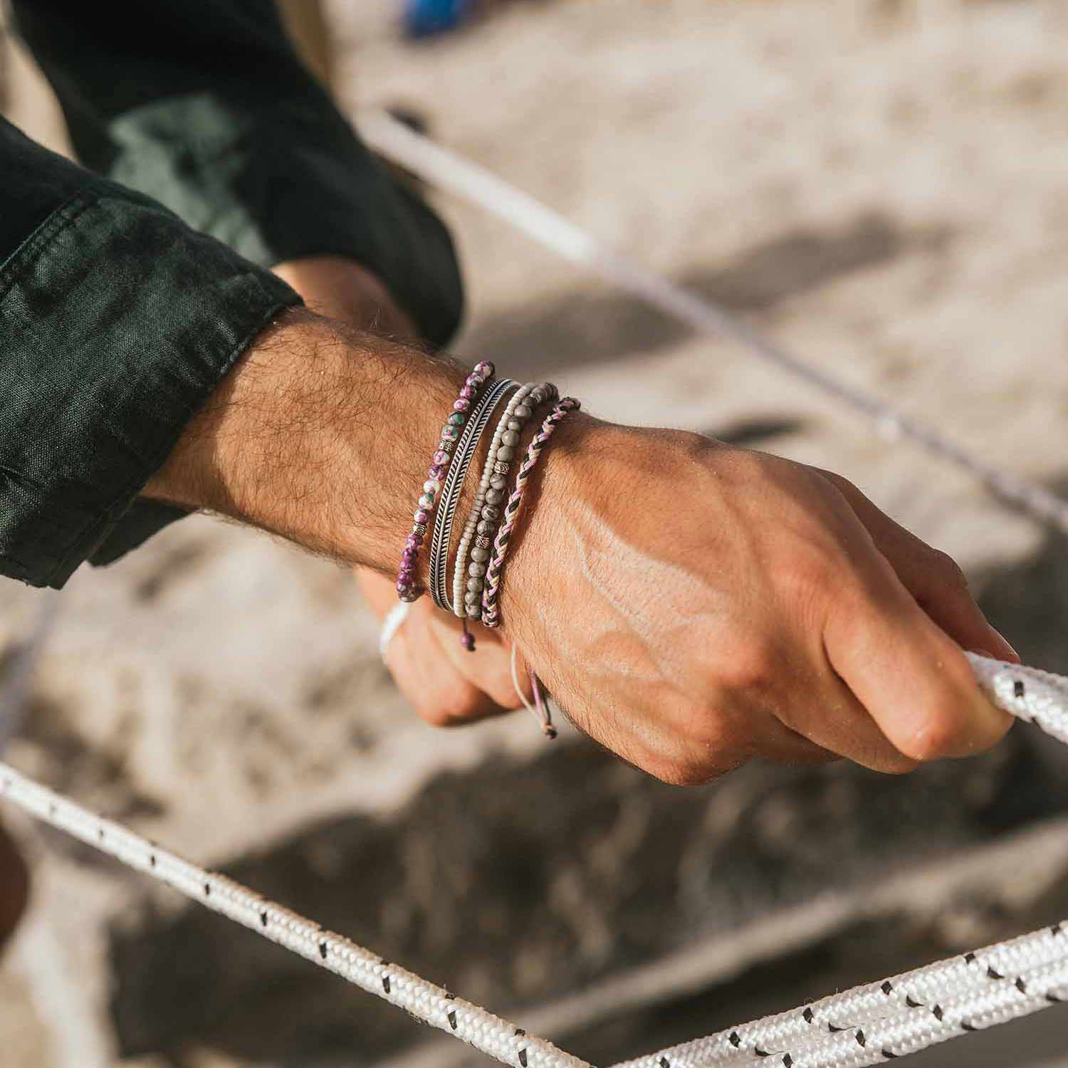 bracelet set on man's hand 