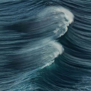 Powerful ocean wave that inspired our handmade blue bracelet