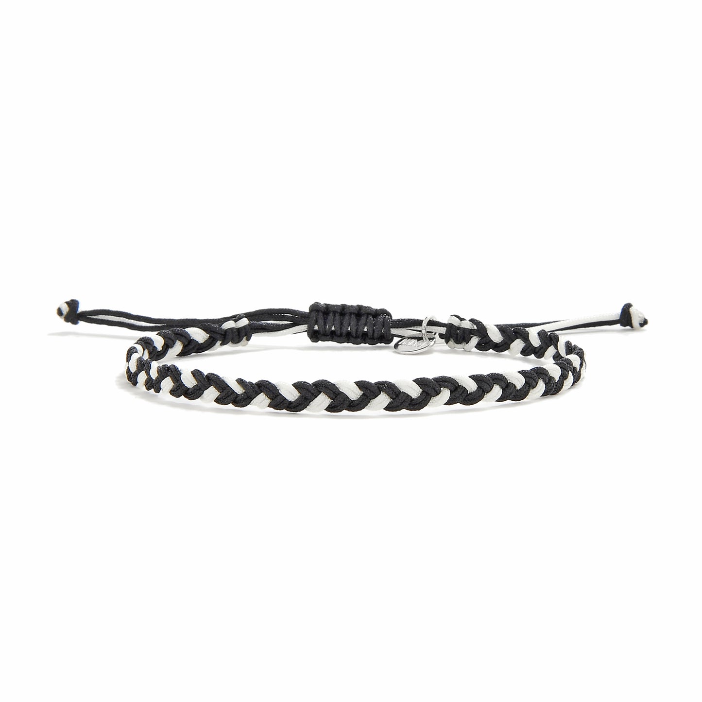 Friendship woven bracelet featuring a black and white twisted cord, displayed on a white background.