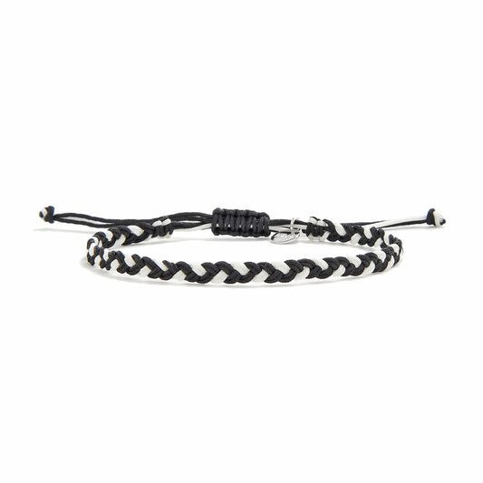 Friendship woven bracelet featuring a black and white twisted cord, displayed on a white background.