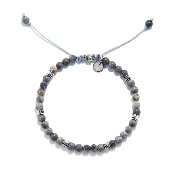 Top view of gray jasper bracelet showing full circular layout and detailed silver spacers