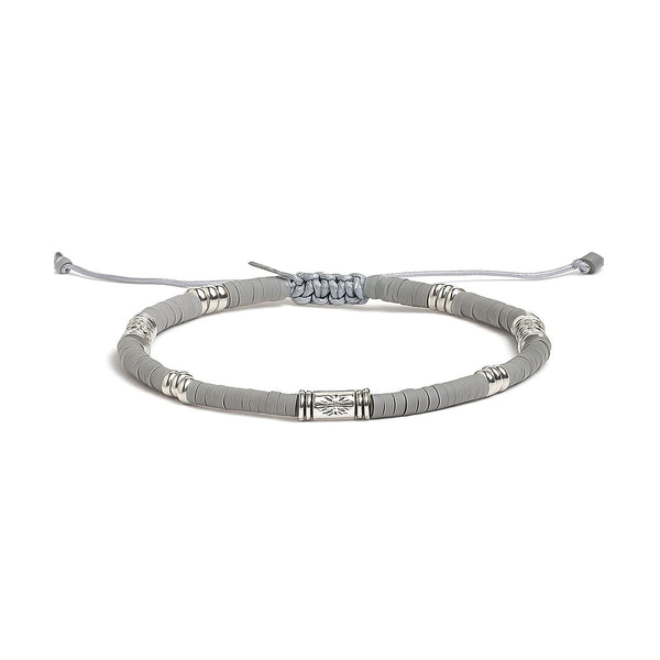 Gray Shamballa bracelet with metal decorative beads and adjustable closure.