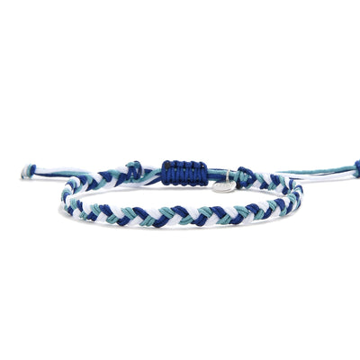 Adjustable woven friendship bracelet in ocean-inspired colors with detailed macrame knot