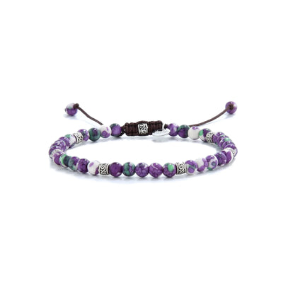 purple jasper bracelet with green, white beads and silver spacers.