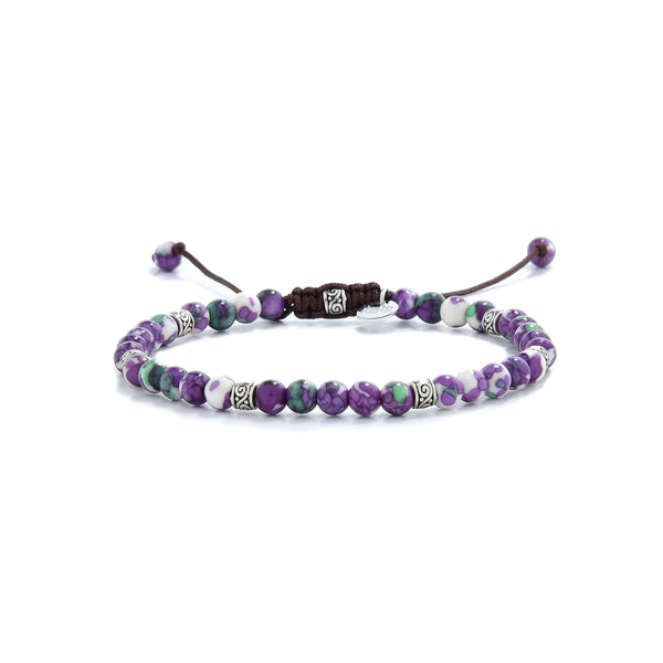 purple jasper bracelet with green, white beads and silver spacers.