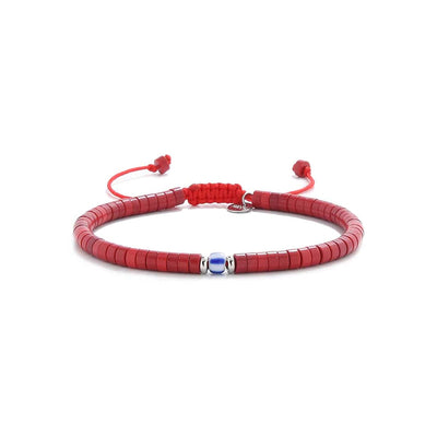 Front view of red gemstone jewelry bracelet featuring matte red clay and blue glass bead