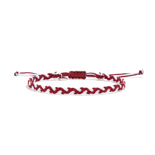 Amiore handcrafted friendship band with red and white braided cords.