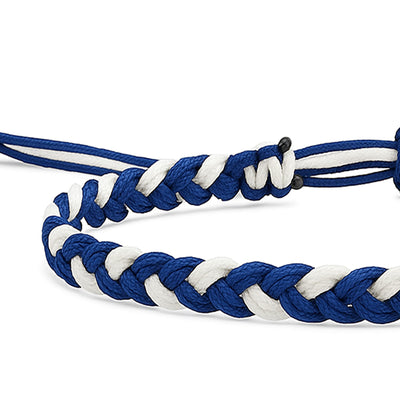 Close-up of blue and white beaded friendship bracelet with braided cord