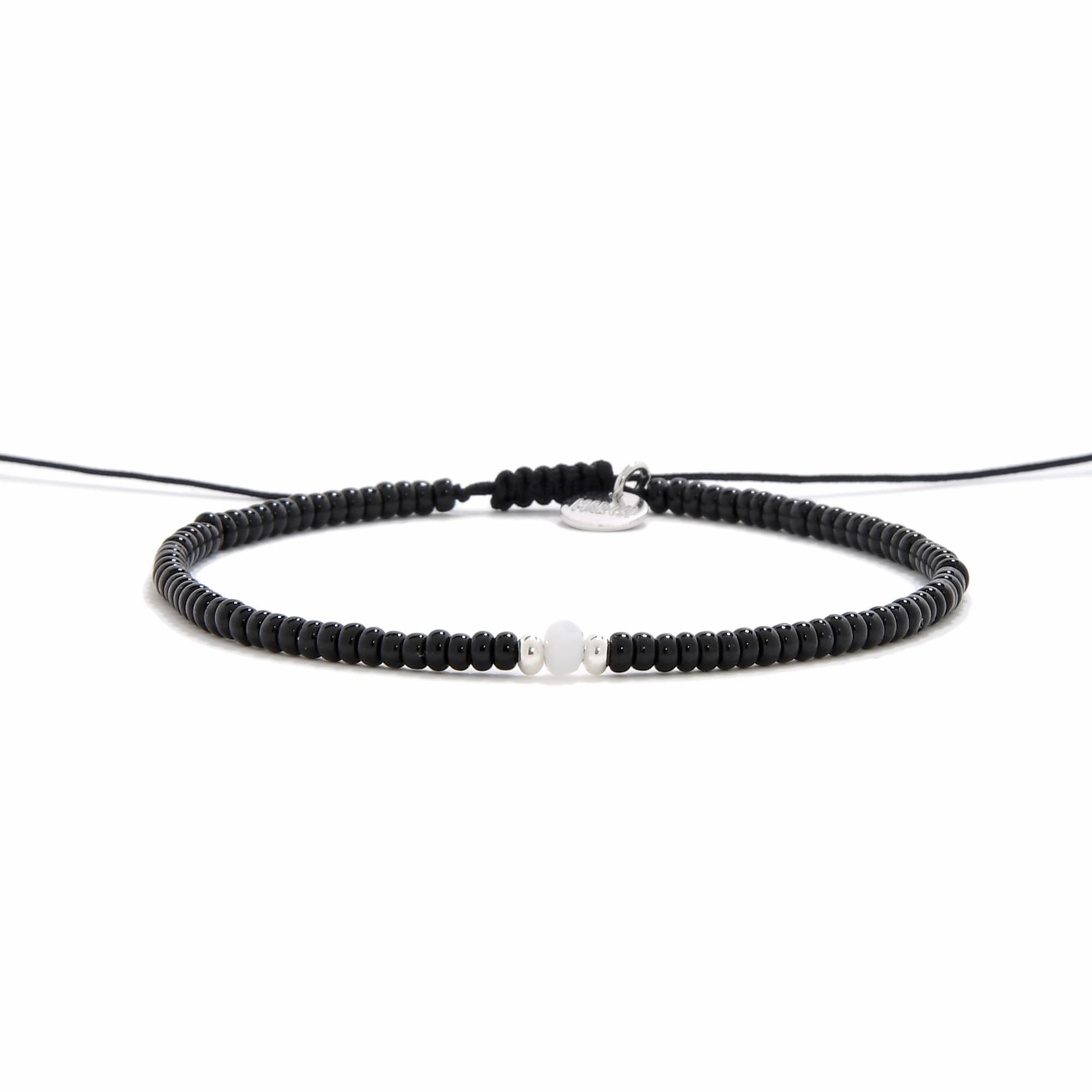 Full front view of Loreto Blanco Diamanti black bead bracelet with white and silver centerpiece