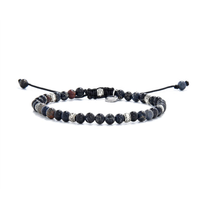 Full view of bracelet with polished black jasper beads and metal decorative accents.