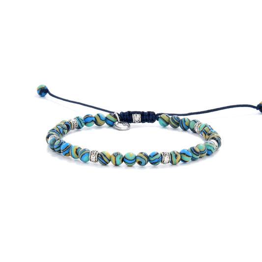 Bracelet malachite fully laid out with adjustable navy cord and polished round beads
