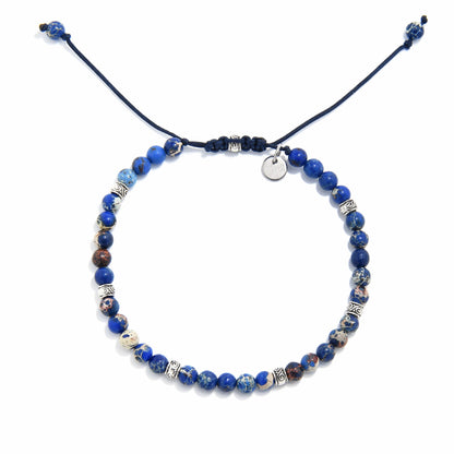 jasper stone bracelet featuring indigo sea sediment beads and silver accents on adjustable navy cord