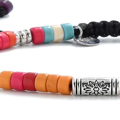 Close-up of side beads and cord on multicolored beaded bracelet