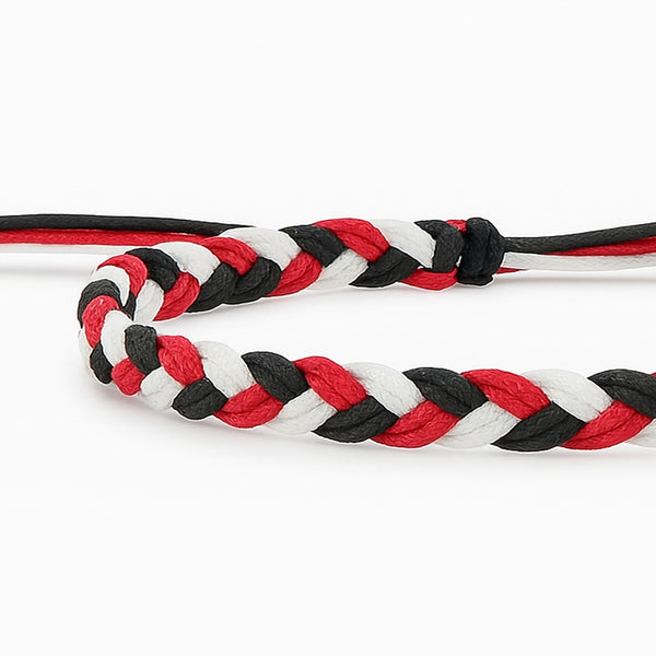 Hand-braided friendship bracelet arts design in red, black and white colors