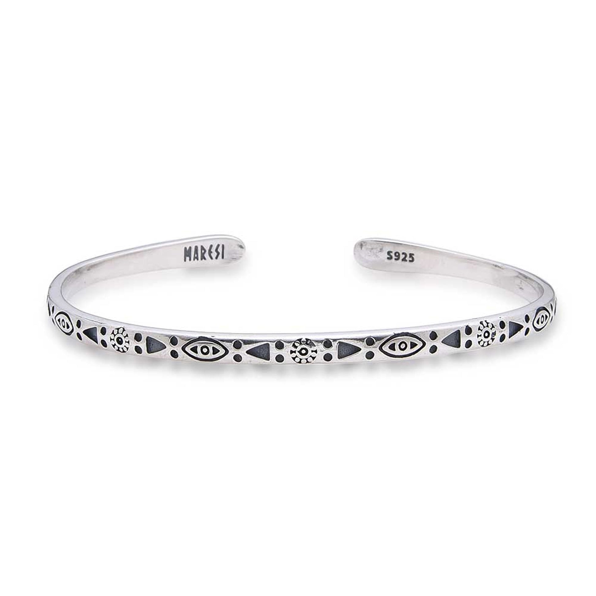 Symmetrical view of mens stainless steel bracelet with symbolic patterns
