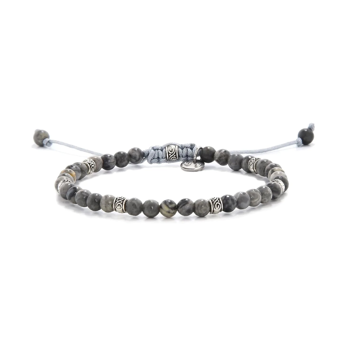 Beaded gray jasper bracelet with metal accent beads on adjustable cord.