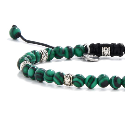 Malachite jewelry bracelet with adjustable black cord and glossy round stones


