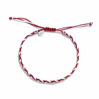 Top view of red and white handmade friendship bracelet with adjustable sliding knot